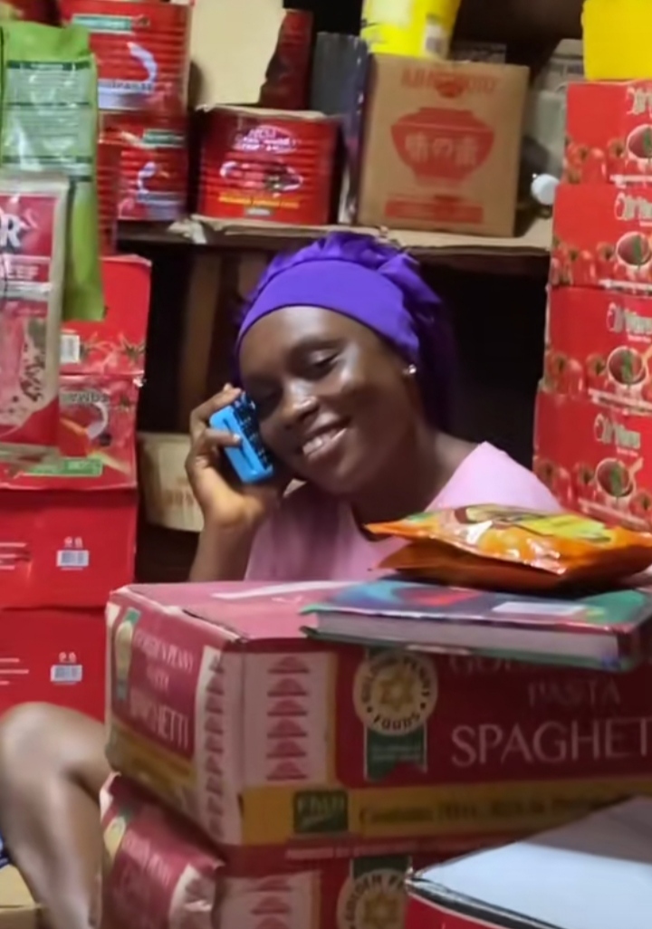 Reactions as lady is spotted making call with POS machine