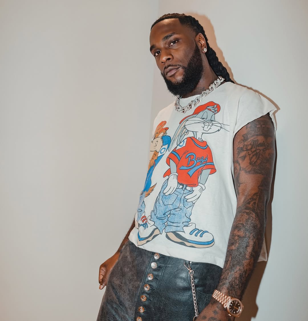 Drama as Burna Boy and Cubana Chief Priest trade words online