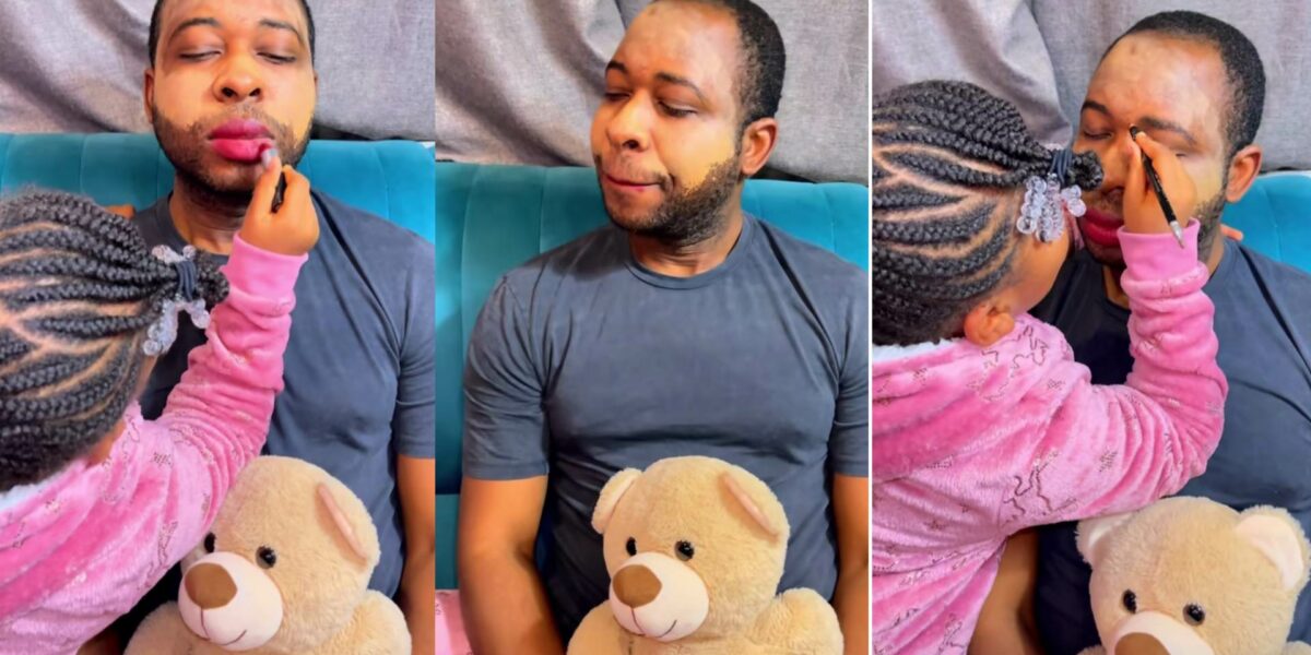 Adorable moment daughter uses dad's face to learn make-up