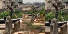 Man bathes publicly in mortuary while standing on top of a grave