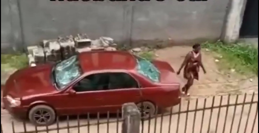 Wife breaks husband's windscreen with stone in viral video, while he watches and records