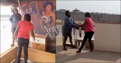 Drama as woman asks for payment after seeing her old wedding banner at a shop