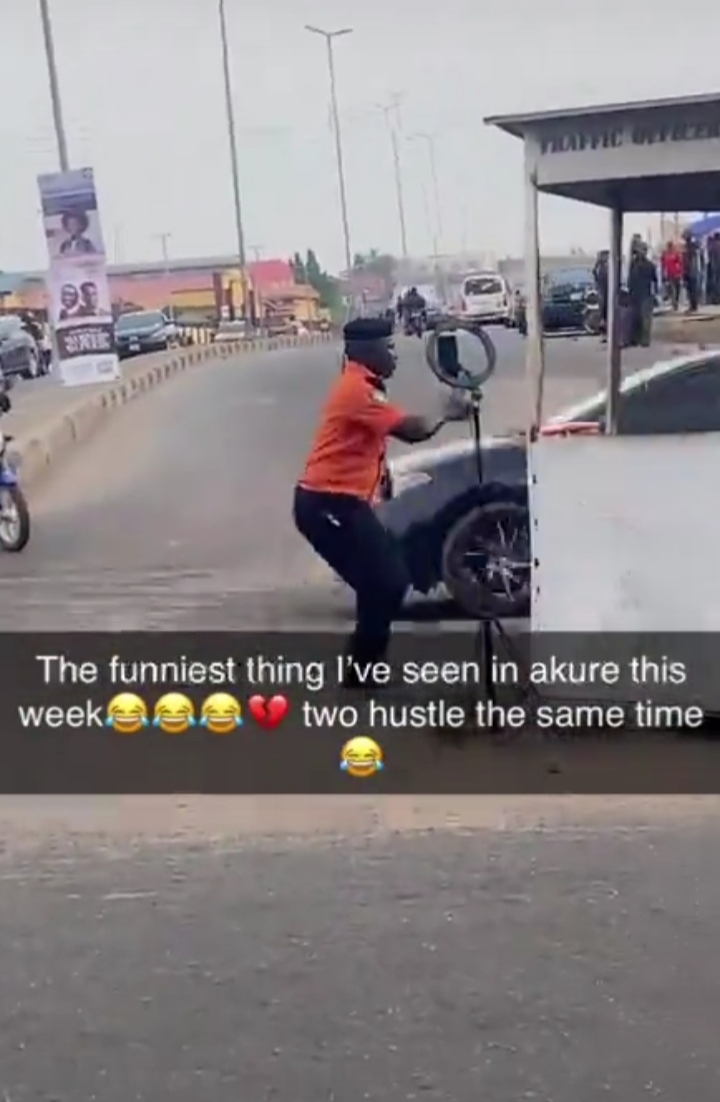 Traffic warden spotted using ring light while on duty