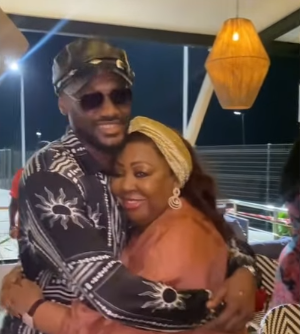 Tongues wag as Senator Ita Giwa hugs 2Face at her birthday dinner