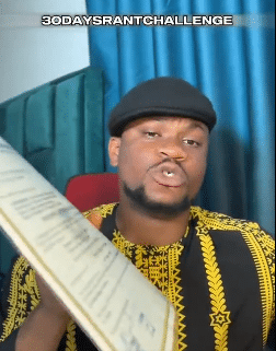 Man laments over bad governance, tears his NYSC certificate